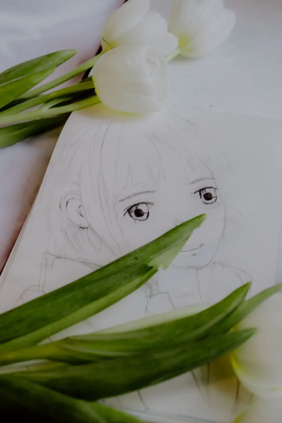 Dessin d’un personnage de manga en cours de réalisation